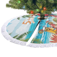 Round Christmas tree skirt with white tassel fringe, colorful tropical parrot design