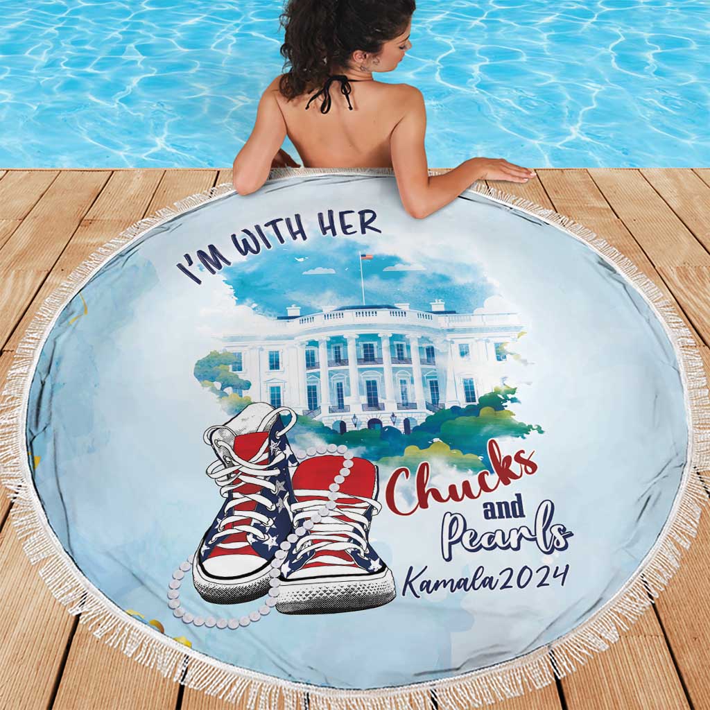 Light blue round beach blanket with fringe border and 'Chucks and Pearls' design