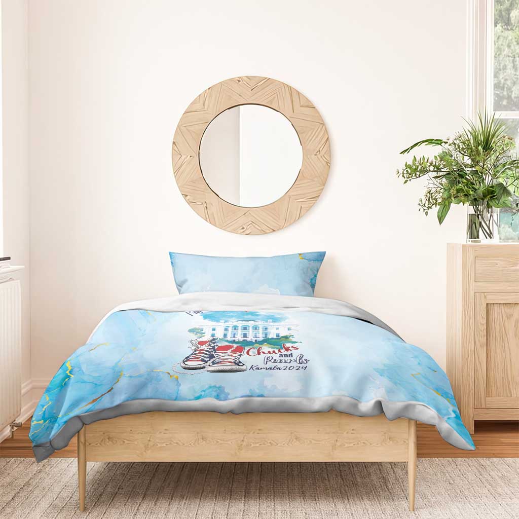 Blue bedding set with “I'm with her” quote and Chucks and Pearls on the duvet