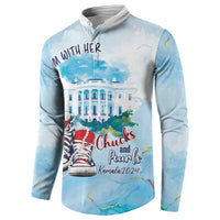Light blue button sweatshirt with 'I'm With Her' text and red shoe graphic