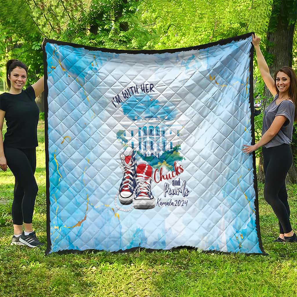 Light blue outdoor quilt with diamond quilting, “Chucks and Pearls” sneaker graphic, “Kamalua 2024”