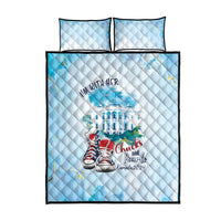 Light blue quilt bed set with two pillows, centered sneaker graphic on quilt top