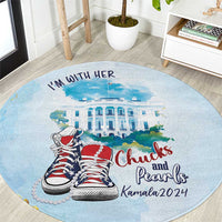 Round blue carpet rug with “I’m with her,” Chucks and Pearls shoes and Kamala2024 text