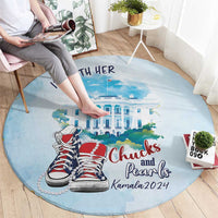 Round blue carpet rug featuring Chucks and Pearls graphic with “I’m with her” headline