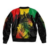 Black bomber jacket with colorful back print of lion and musicians, ribbed cuffs