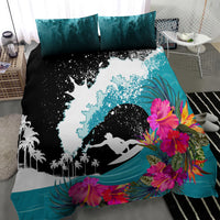 Surfing bedding set with black wave splatter, white surf silhouette, teal water and floral blooms