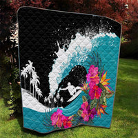 Surfing-themed quilt featuring a large wave silhouette in black and teal with hibiscus flowers.