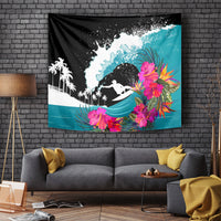 Black surf rider tapestry with turquoise ocean waves, pink flowers, and palm silhouettes