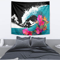 Black surf rider wall tapestry with turquoise wave backdrop and bright pink tropical flowers