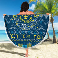 Blue round beach blanket with fringe, menorah and Star of David ring, 'Happy Hanukkah'.