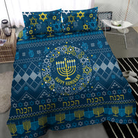 Blue bedding set close-up with circular menorah wreath, Star of David pattern, 'Happy Hanukkah'