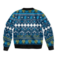 Blue unisex bomber jacket with Hanukkah geometric pattern and menorah lights, ribbed hem