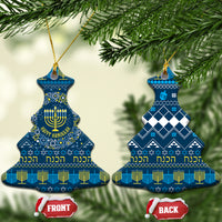 Blue ceramic Hanukkah ornament set, Christmas tree shape with menorah pattern and gold loop.