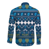 Blue long-sleeve button shirt with holiday pattern and Hebrew text on back