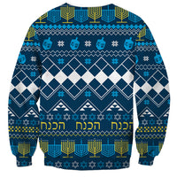 Blue unisex sweatshirt with festive Hanukkah pattern and repeated Hebrew text at hem
