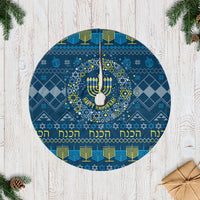 Blue Hanukkah tree skirt with Star of David menorah design and Hebrew text