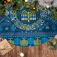 Blue circular Hanukkah tree skirt with menorah and geometric Star of David pattern