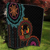Black quilt featuring Kwanzaa mandala artwork, “Happy” lettering, and central candle