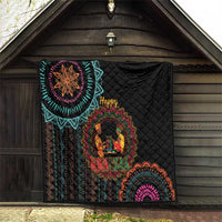 Black quilt displayed on wall with Kwanzaa mandala, “Happy” lettering, and fan border