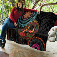 Black Kwanzaa quilt draped on sofa with colorful mandala, “Happy” text, and candles