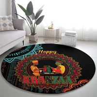 Black round Kwanzaa mandala carpet with “Happy Kwanzaa” headline and central candle figures.