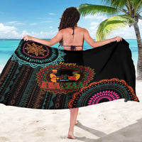 Black Kwanzaa sarong with central mandala and multicolor geometric band, worn back view
