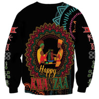 Black unisex sweatshirt with large Kwanzaa mandala graphic and sleeve musical symbols