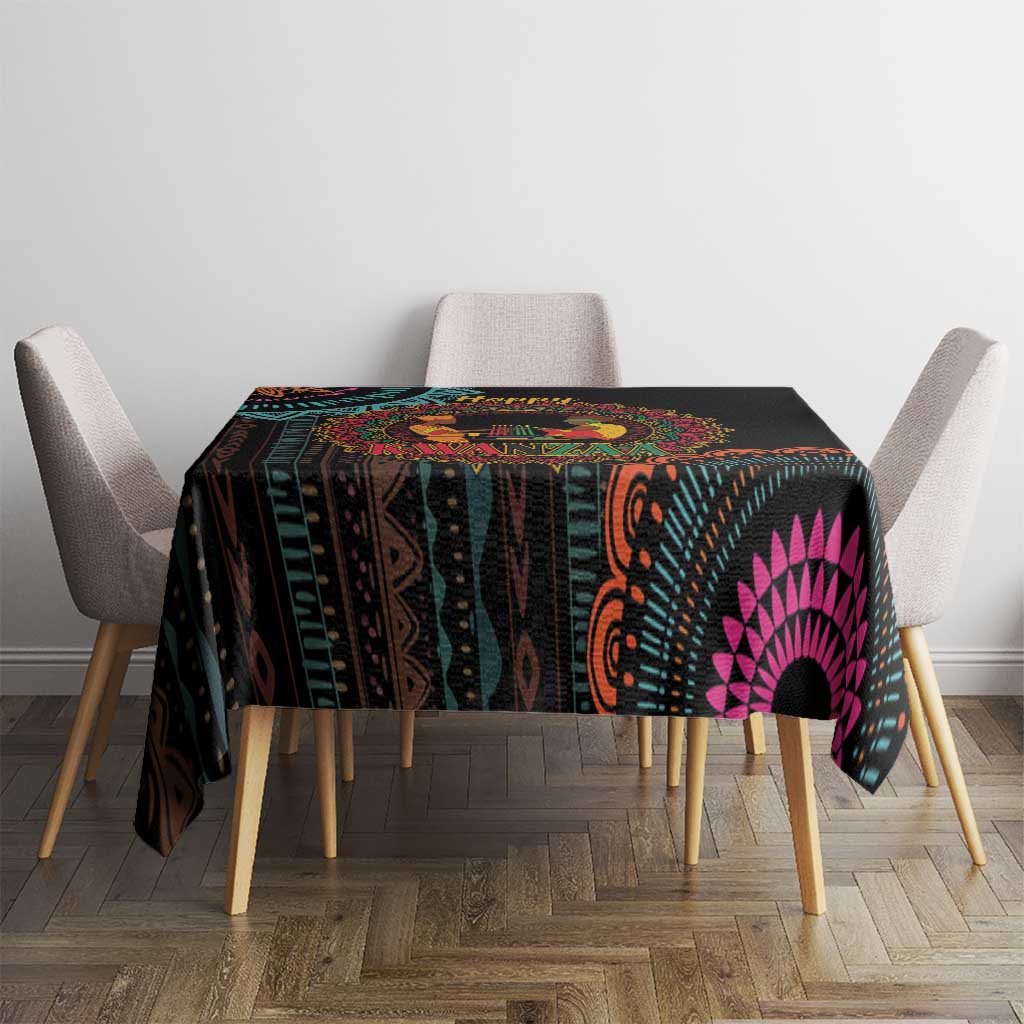 Black tablecloth with vibrant mandala pattern and magenta circular centerpiece