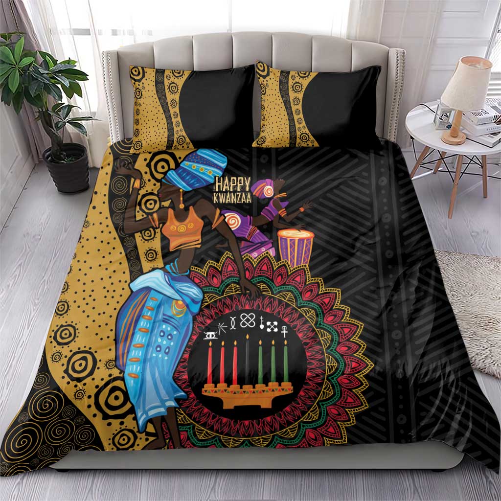 Black African Kwanzaa bedding set on bed with two yellow patterned accent pillows