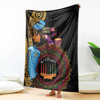 Black Kwanzaa African blanket with central candle circle and dancers, held up for view