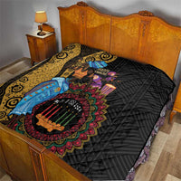 African quilt on wooden bed: black backing with yellow stripe and colorful mandala center