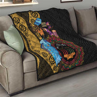African quilt on sofa: black quilt with yellow swirl stripe and colorful mandala candle motif
