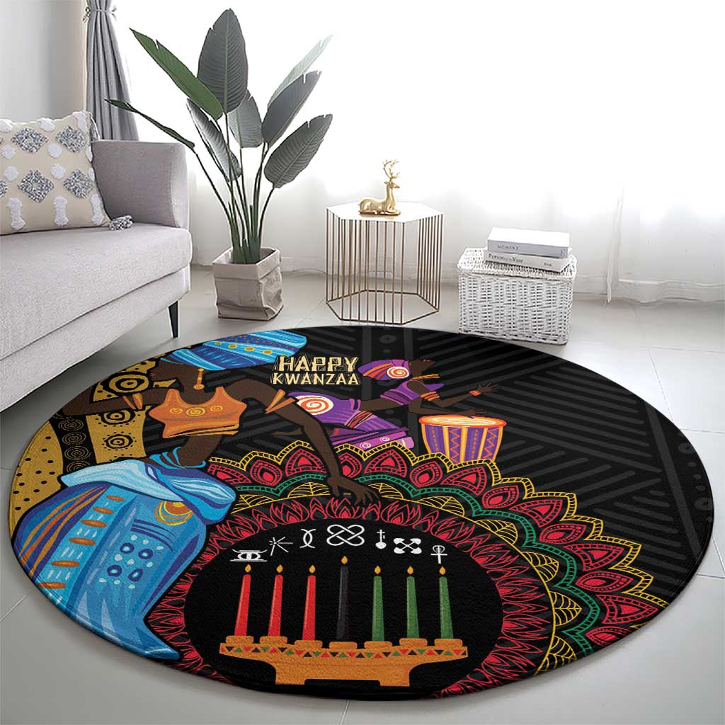 Black round carpet with colorful tribal design, central candle row, and “Happy Kwanzaa” text