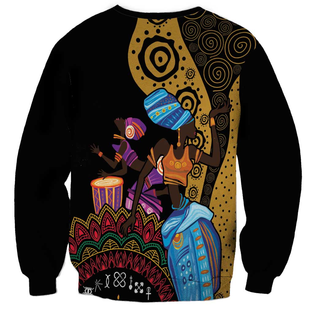 Black unisex sweatshirt with tribal dancer mural graphic featuring drums and colorful figures