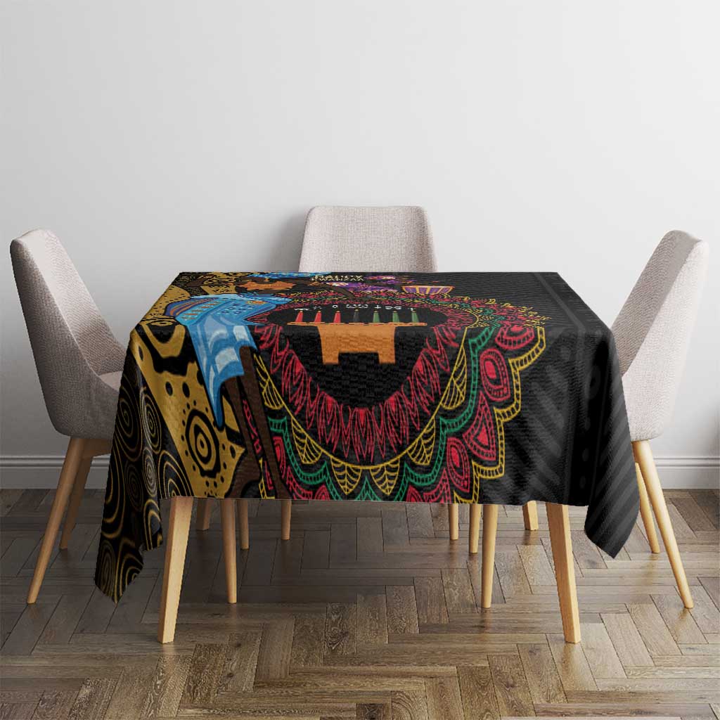 Black tablecloth with vibrant tribal medallion print and colorful fringe