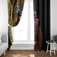 African window curtain panels framing a window: one gold swirl print, one dark patterned panel.
