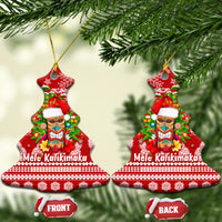 Red Christmas tree-shaped ceramic ornament with Mele Kalikimaka tiki design and gold loop