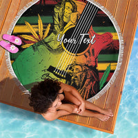 Rectangular beach blanket with white fringe, reggae guitar portrait graphic with 'YourText'.