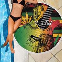 Draped round beach blanket with white fringe, reggae portrait guitar graphic and 'YourText'.
