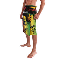 Personalized reggae graphic board shorts, green and yellow with red accents, knee length