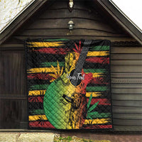 Reggae soul quilt hanging in a shed, with colorful reggae guitar and dancer graphics