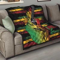 Reggae soul quilt on a gray sofa, with colorful reggae guitar and dancer print