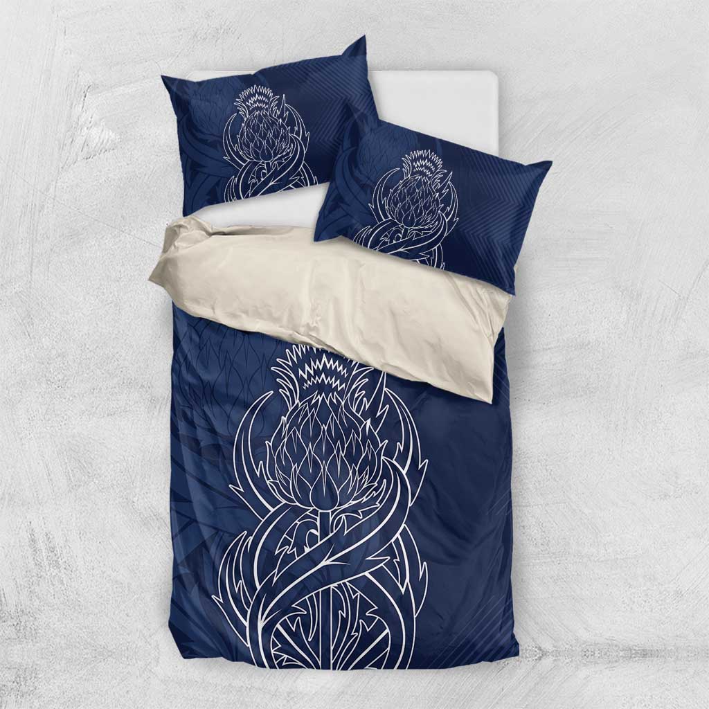 Blue duvet cover set with two pillows; cream overlay with white thistle line art