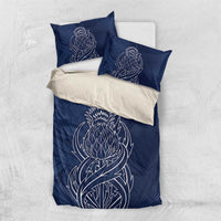 Blue duvet cover set with two pillows; cream overlay with white thistle line art