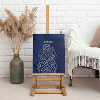 Blue thistle canvas wall art with 'YOUR TEXT' and white line artwork on easel