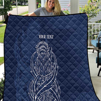 Blue quilt blanket with thistle line art and 'YOUR TEXT' center