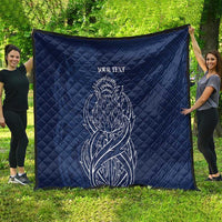 Blue quilt blanket with thistle line art and 'YOUR TEXT' display