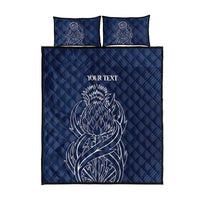 Blue quilt bed set flat lay: quilt with thistle line-art, two pillowcases, your text