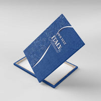 Angled view of blue canvas wall art showing “Italy Italiana” and “Your Text”