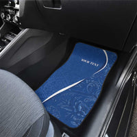 Blue car floor mat with white swoosh and 'YOUR TEXT' on passenger seat
